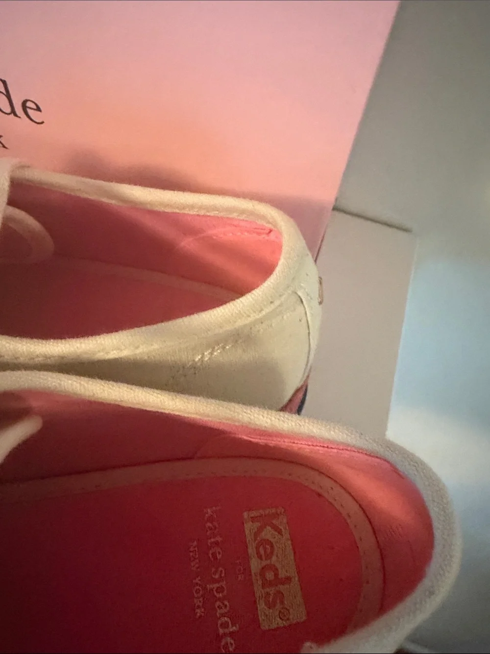 kate spade cream canvas platform sneakers with pink and gold accents